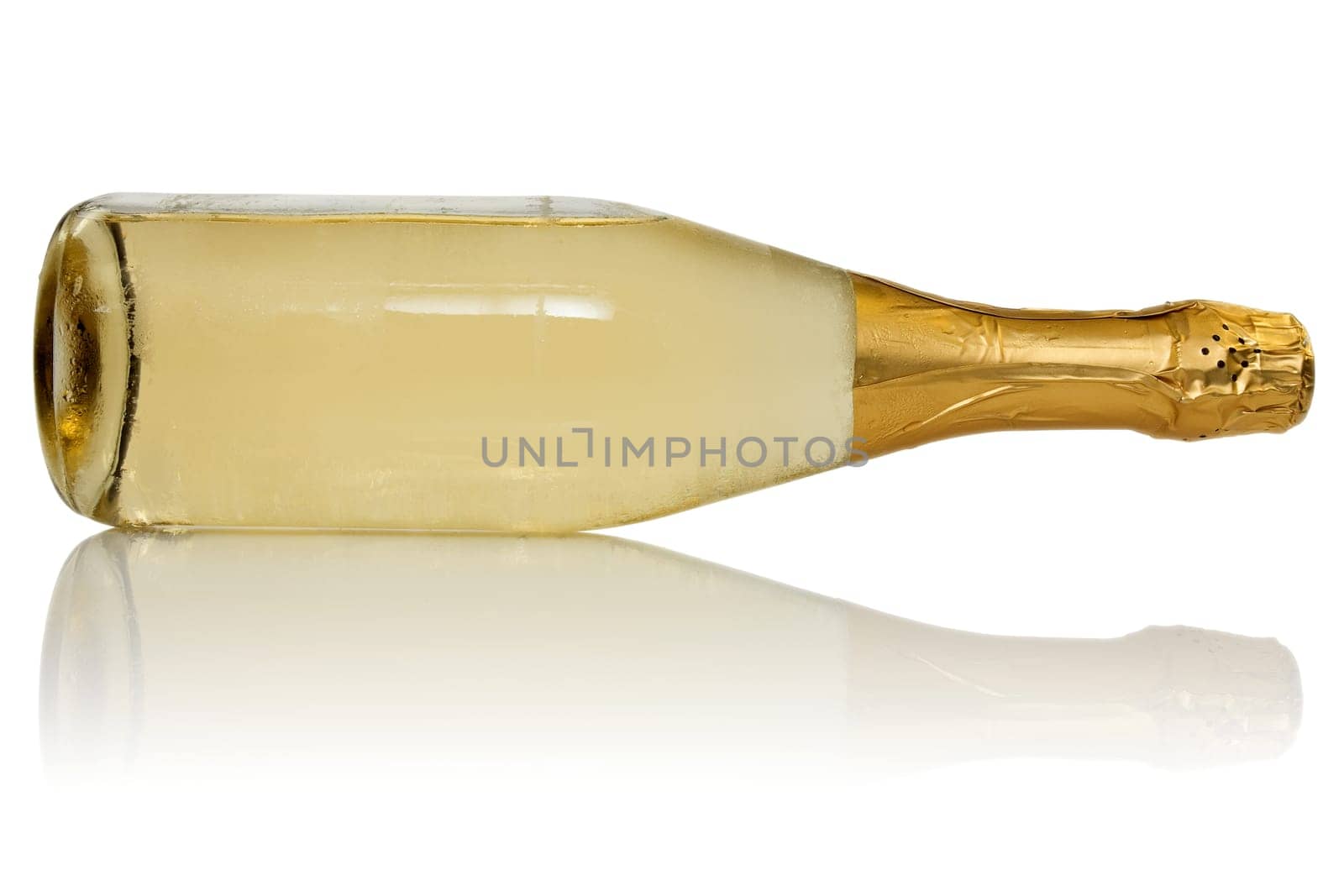 Bottle of champagne with reflection on white background.