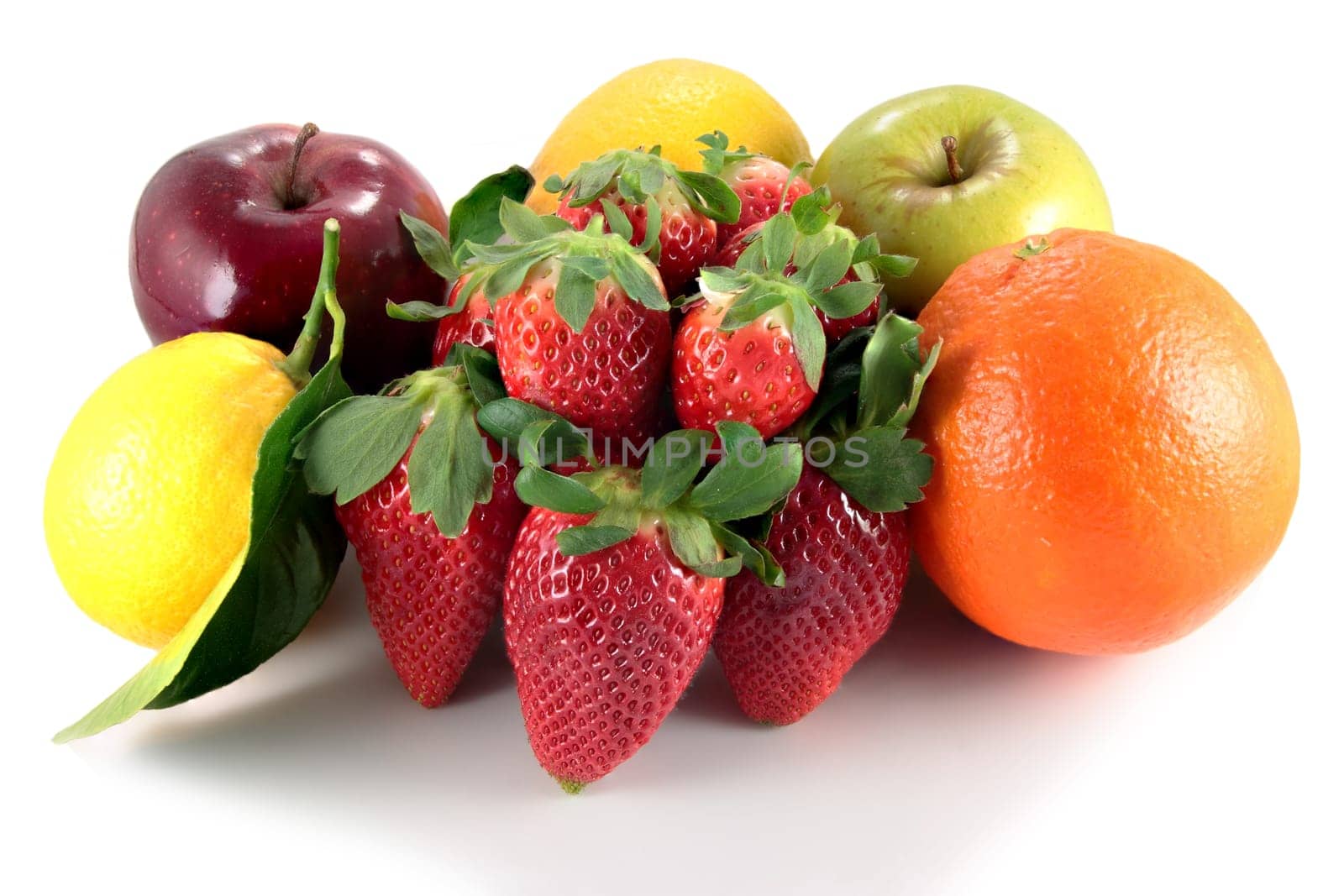 strawberries apples orange and lemons on white background