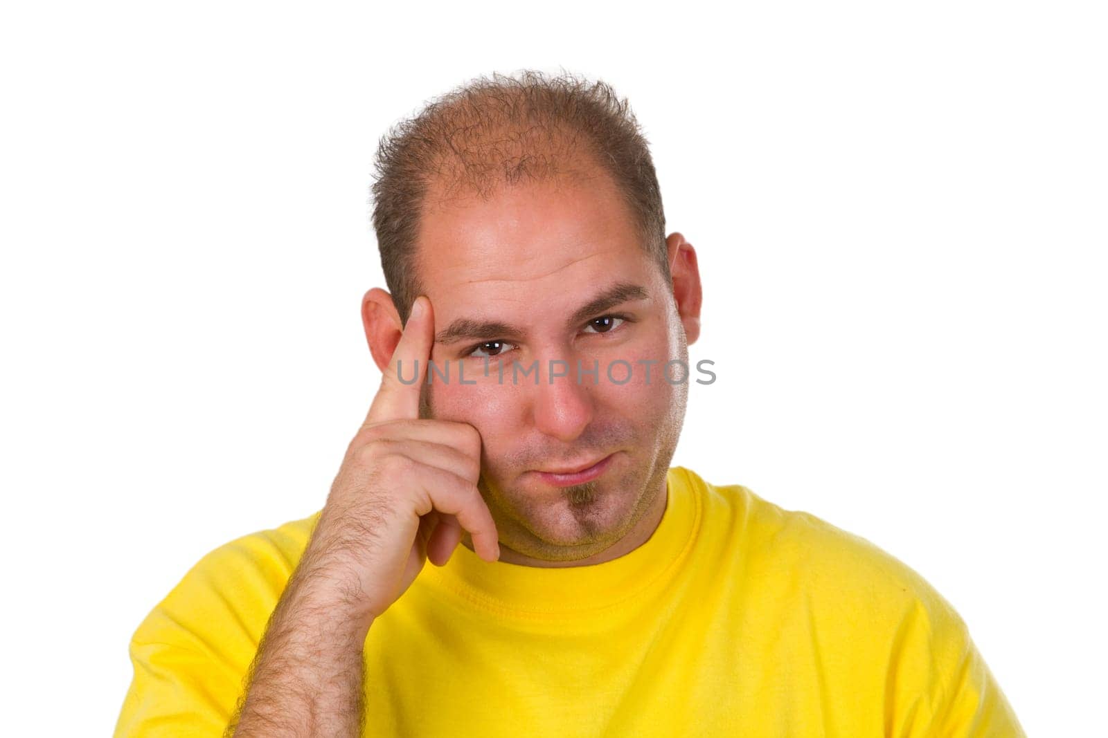 Young pensive man isolated on white background