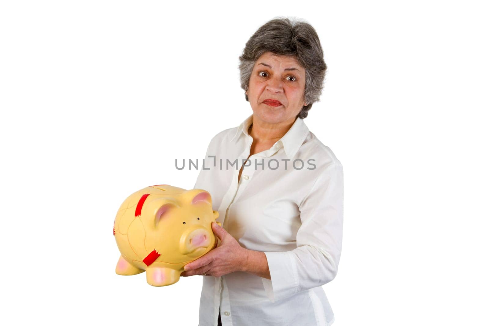 Senior woman with piggy bank - isolated on white background