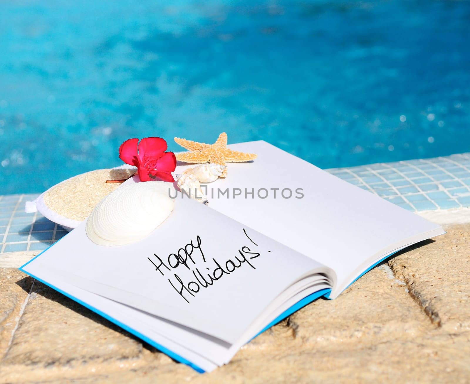 open book with strfish outdoor with swiming pool background