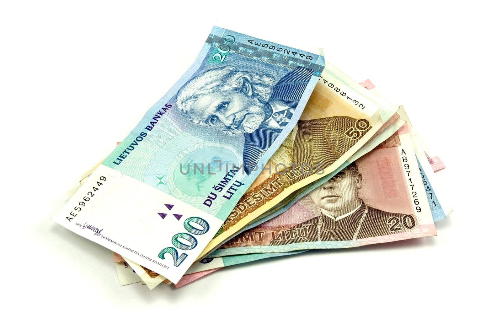 pile of paper banknotes isolated on white background