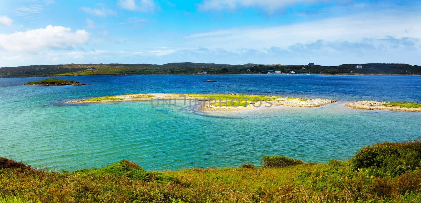 Small islands at Clifden Bay in summer, Conemara, Ireland.