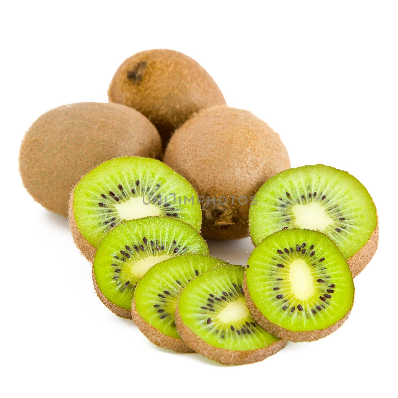 A few brown fresh kiwi fruits, slices