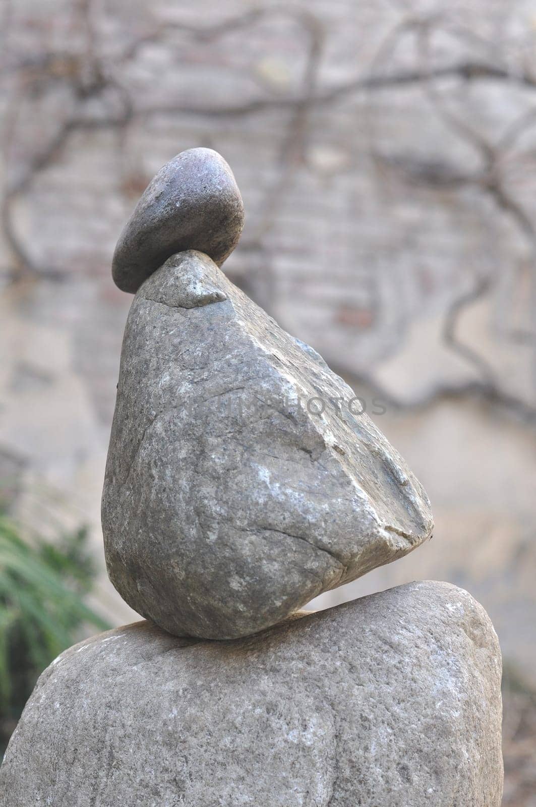 Balanced stones sculpture over blurred background