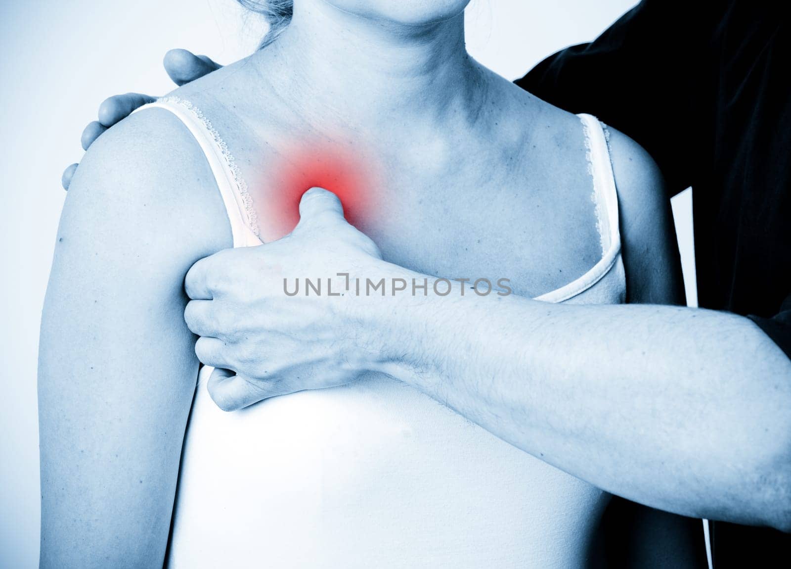 Massage therapist giving a massage. female receiving professional massage. pain concept.