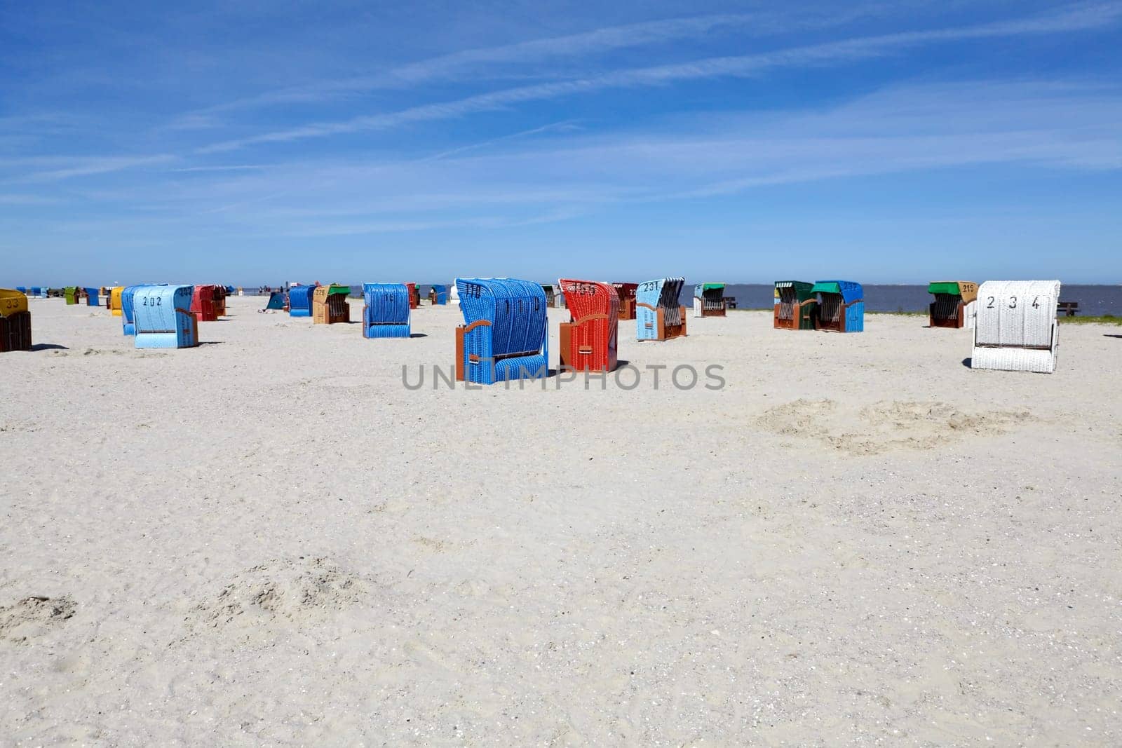 Numerous beach chairs on the beach of the Baltic Sea