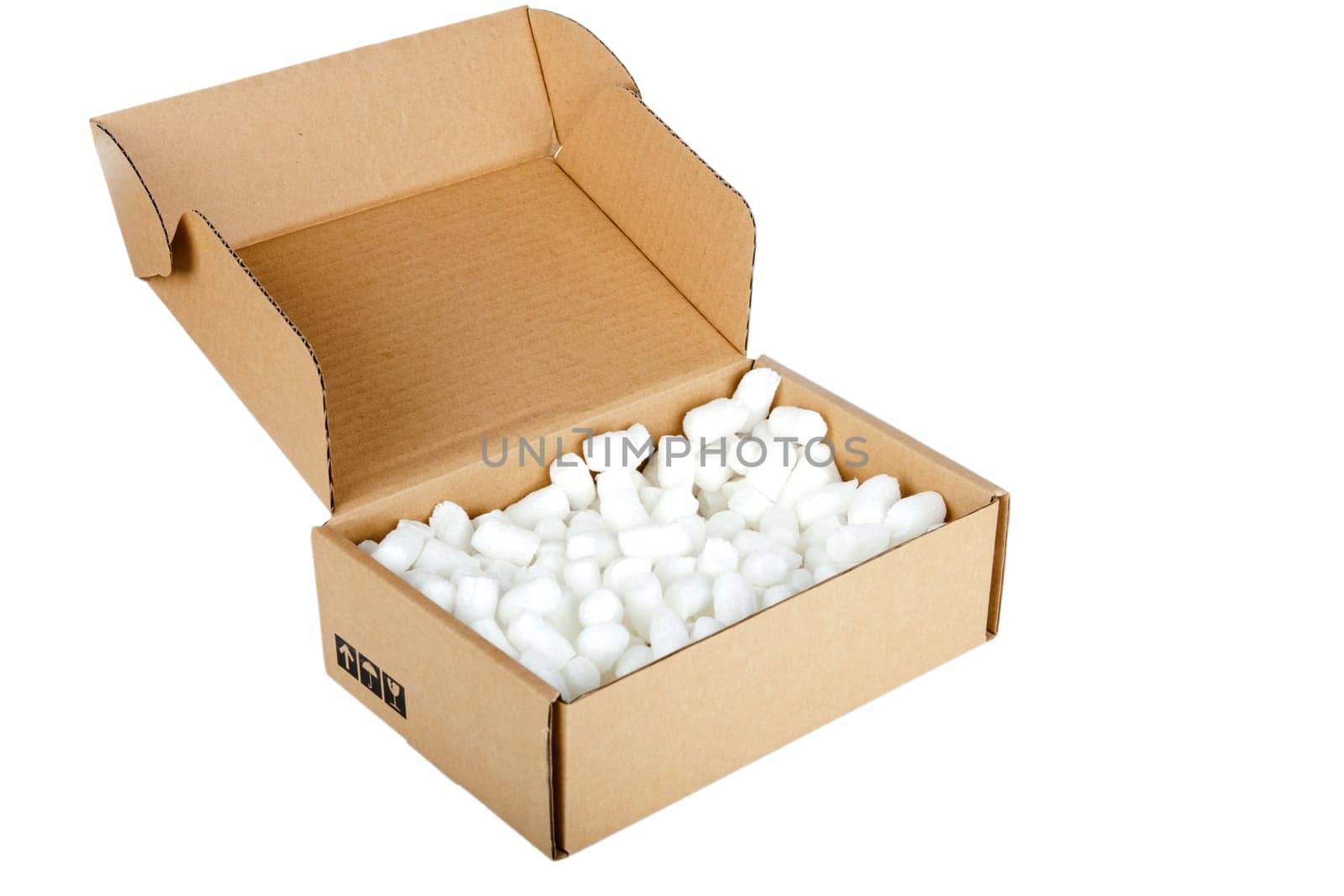 Cardboard box opened with packaging material against white background