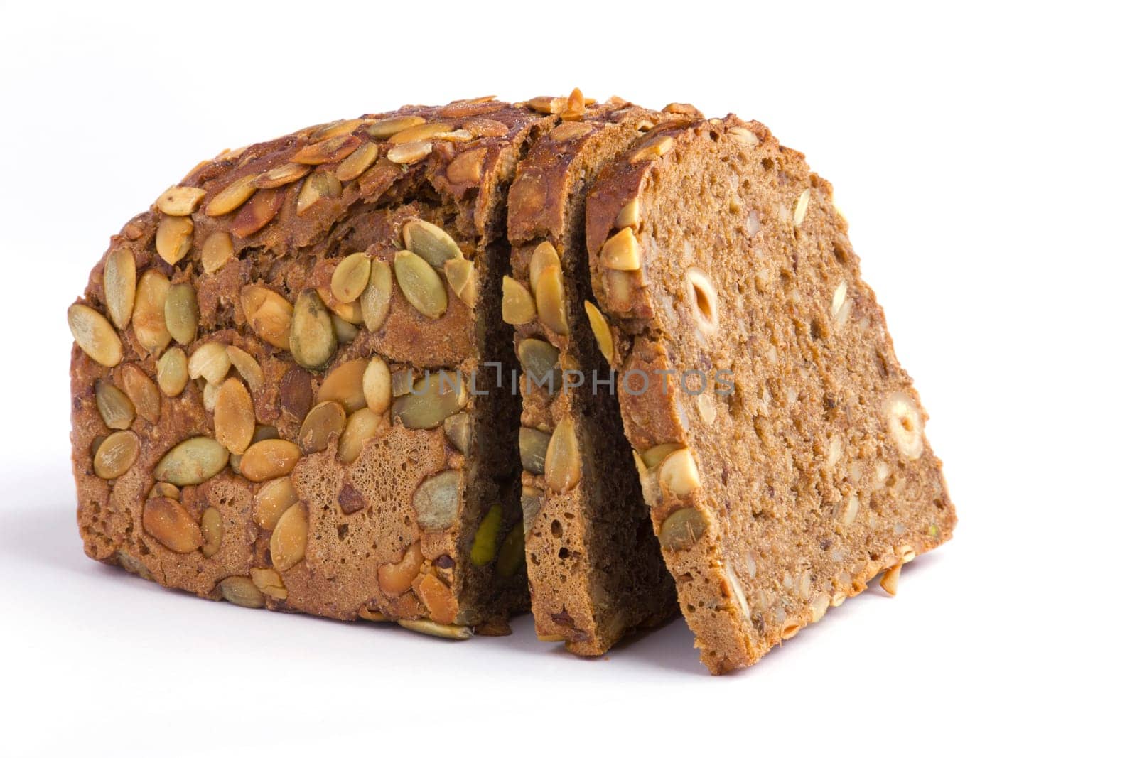 A loaf of wholemeal bread on a white background