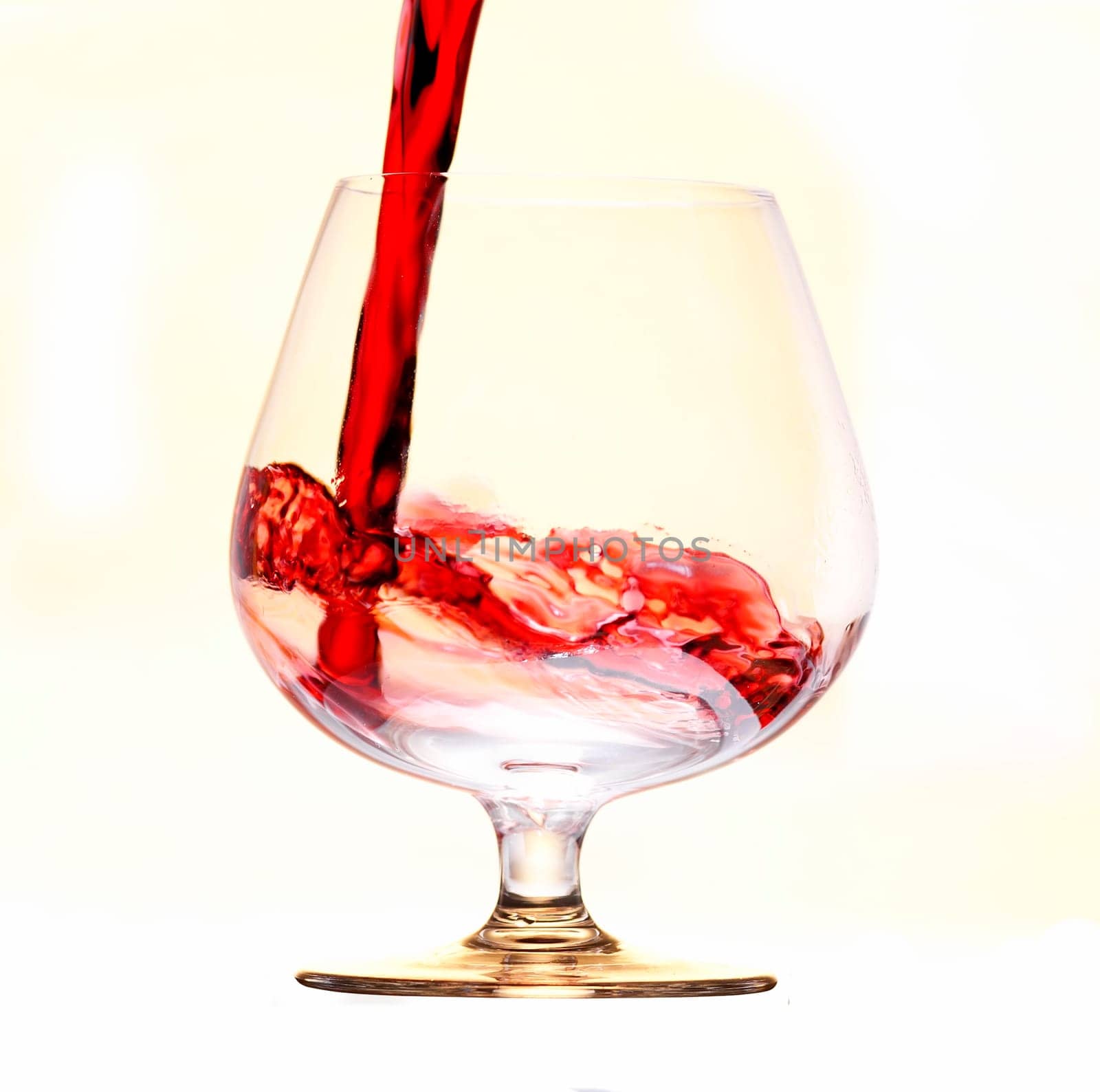 Detail of the wine glass - pouring wine