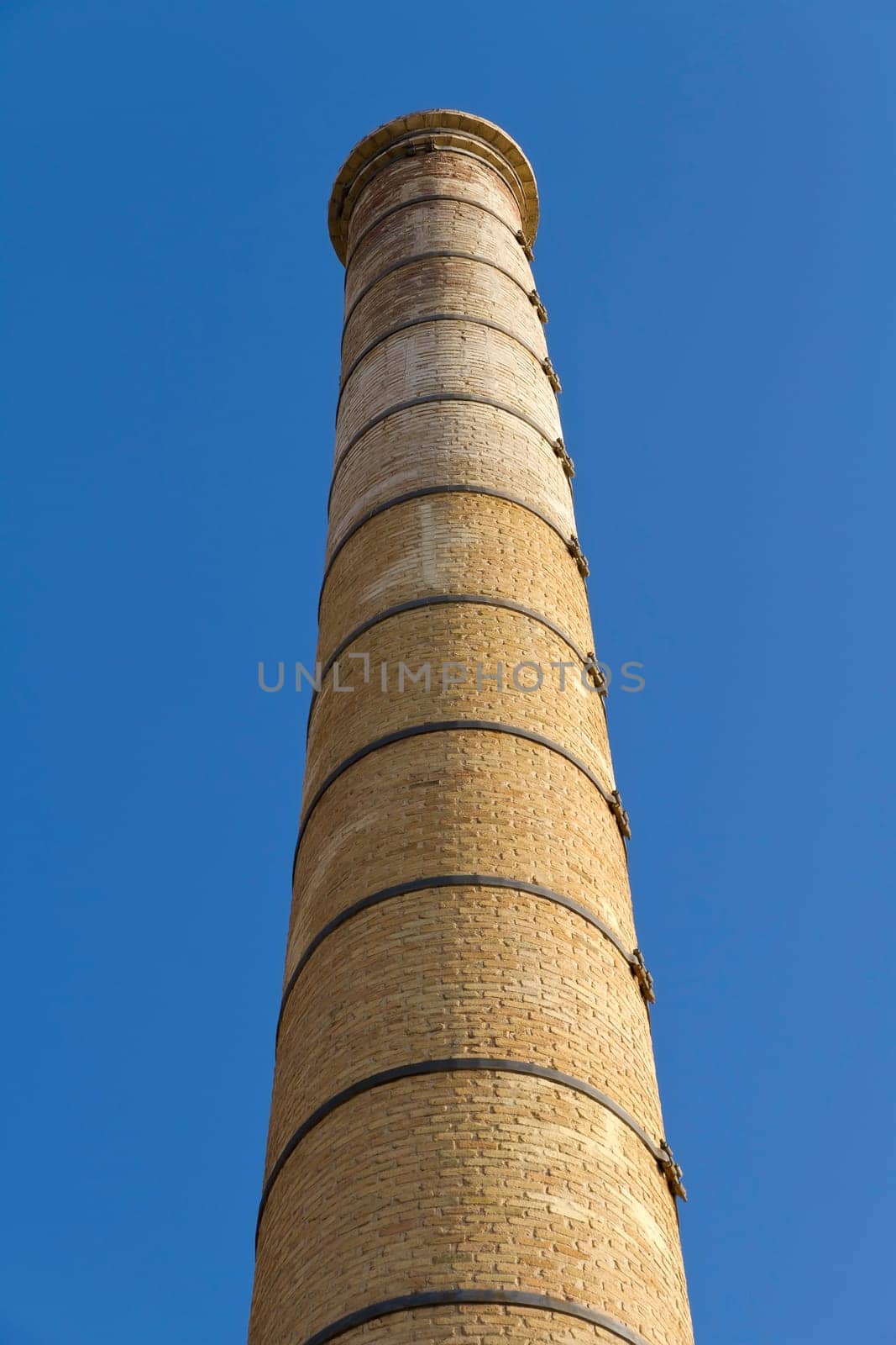 Old fireplace, industrial symbol. In Badalona, Barcelona, old industrial area. Spain