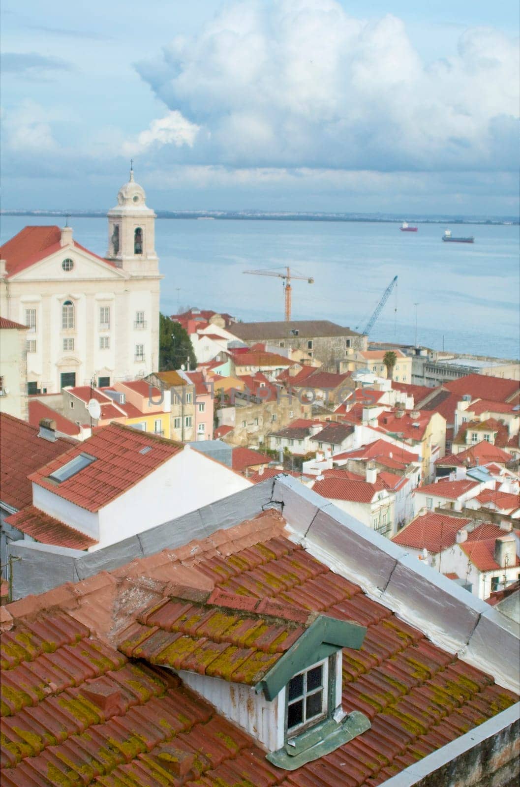 View of Lisbon wth church and river on the background