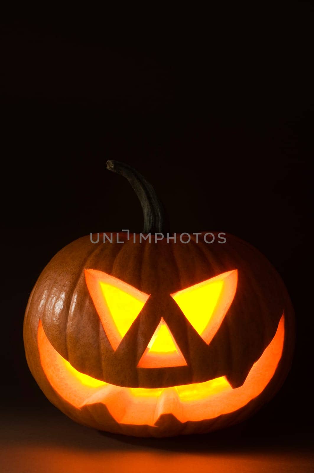 Halloween pumpkin on dark background close up shoot