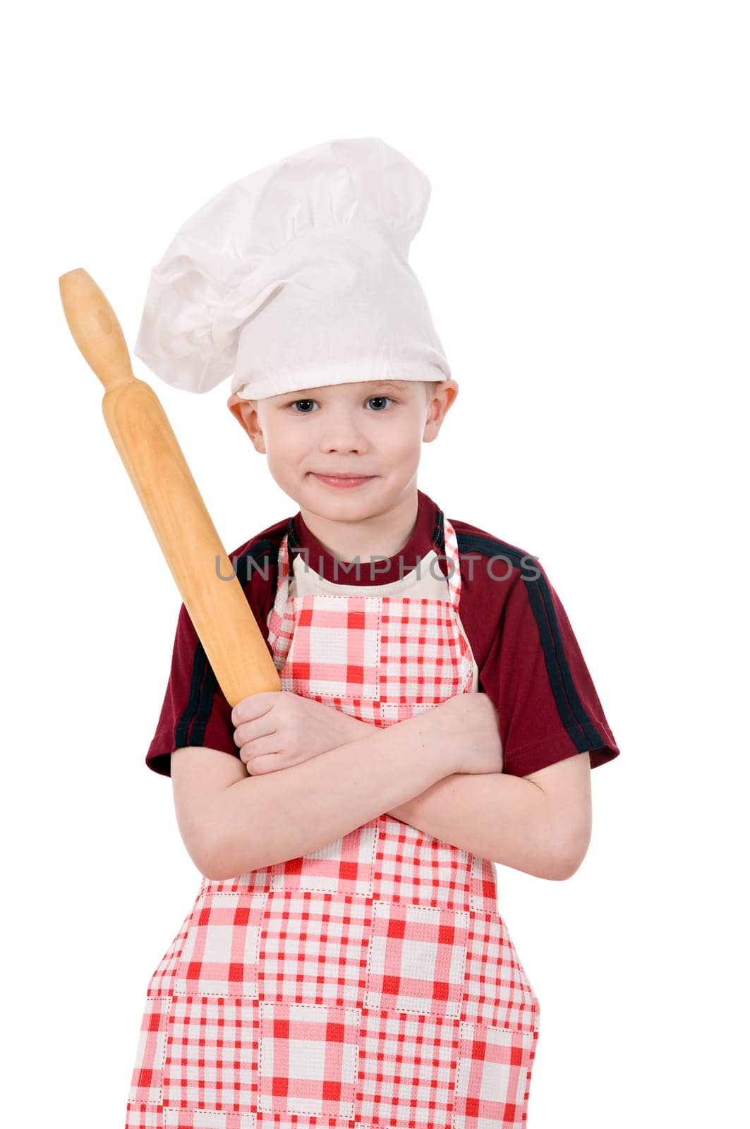 boy in chef&#039 s hat stand crossed arms isolated on white background