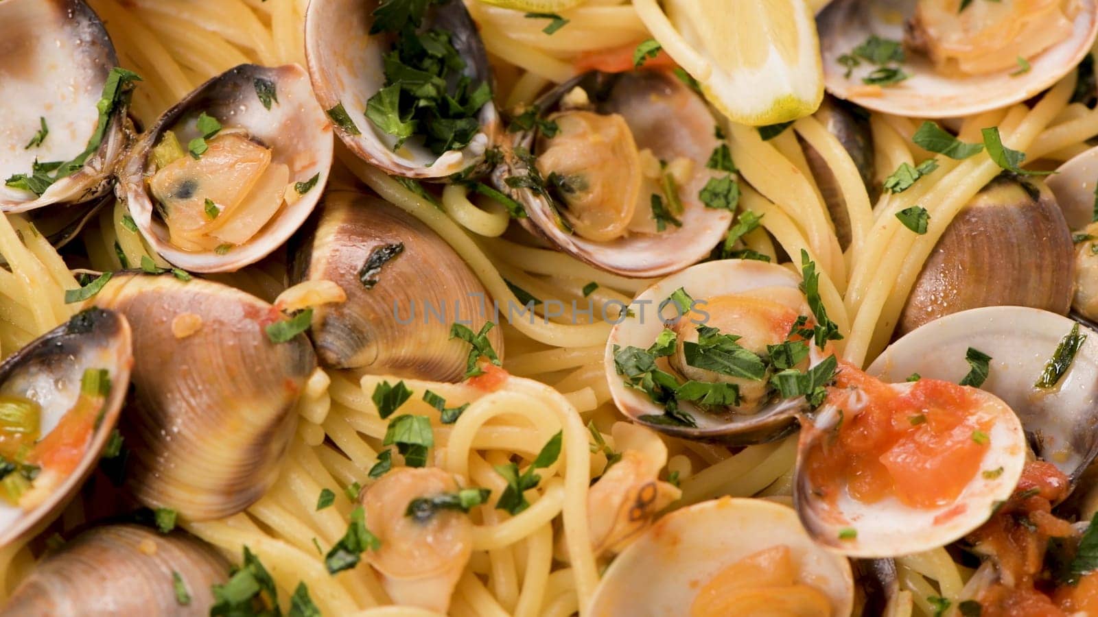 Traditional italian seafood pasta with clams Spaghetti alle Vongole.