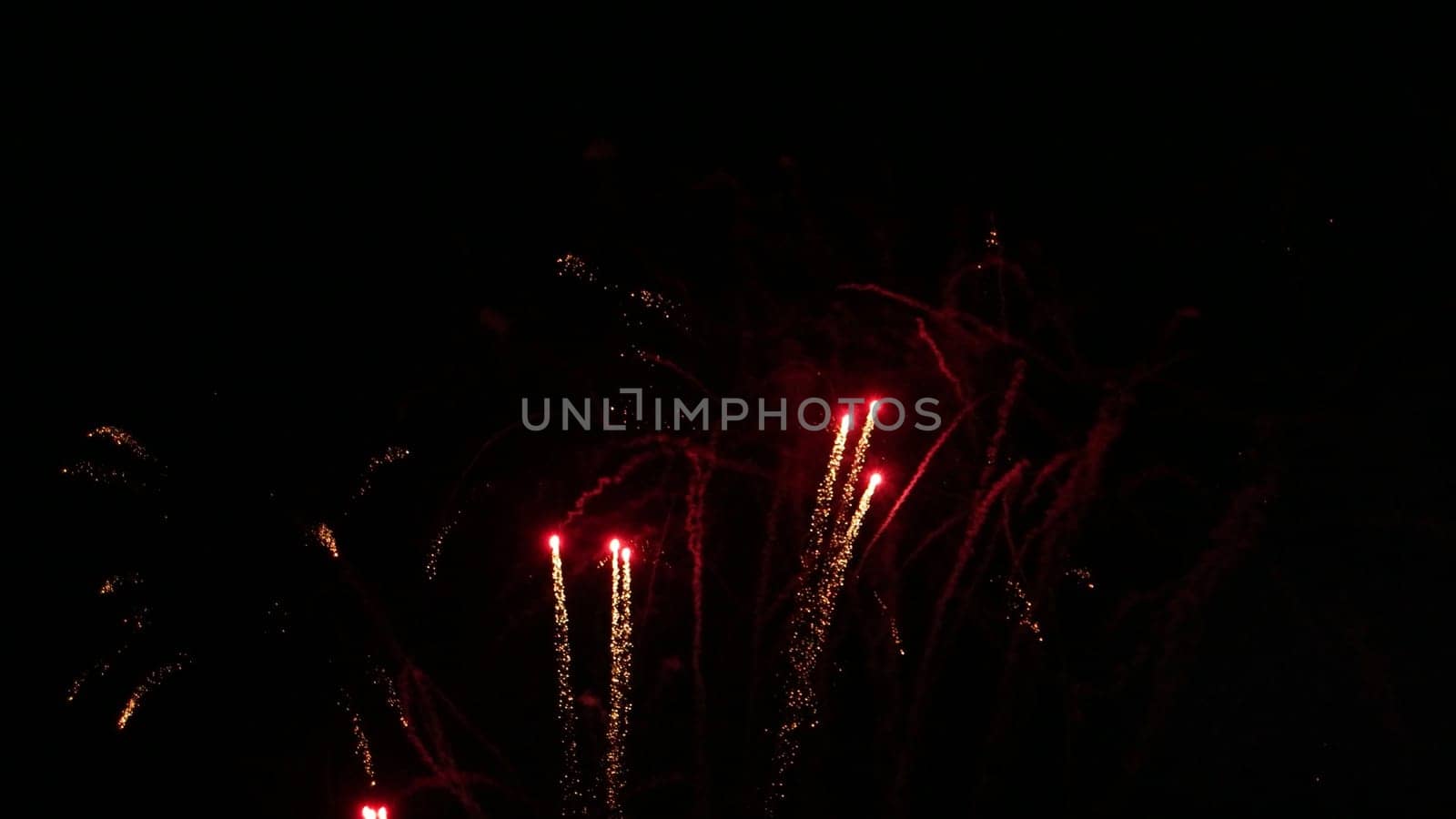 Beautiful fireworks show on a dark night sky.