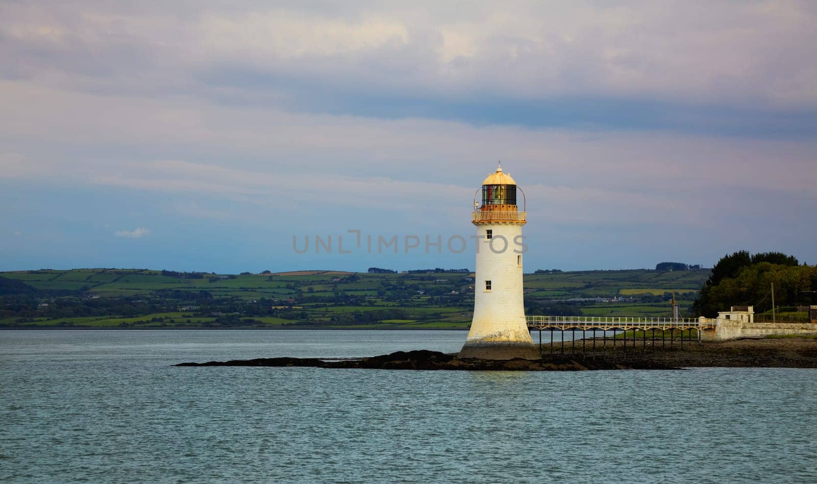 Tarbet lighthouse and the Shannon river estuary, Ireland.
