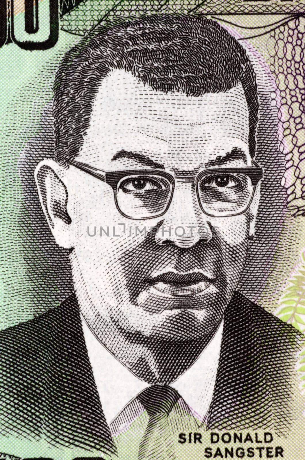 Donald Sangster (1911-1967) on 100 Dollars 2007 Banknote from Jamaica. Jamaican politician and the second Prime Minister of Jamaica.