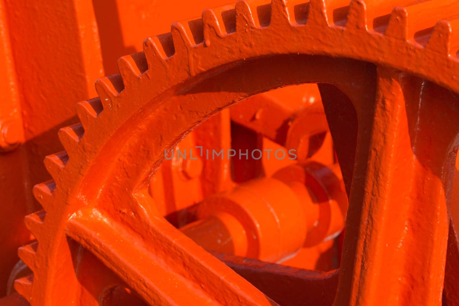 Detailed view of the red-coated gears