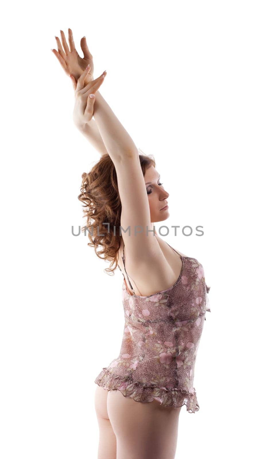 nude brunette woman in short peignoir take hands on breast