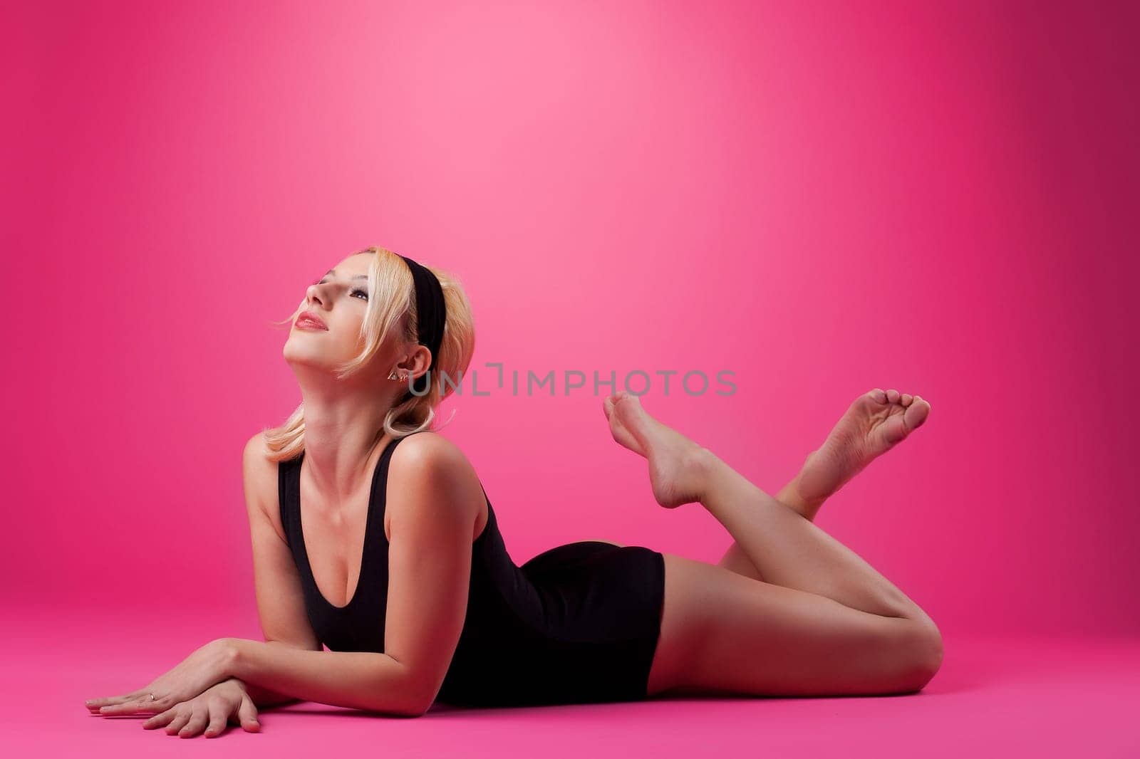 Beauty sexy woman sport pin-up style on pink background