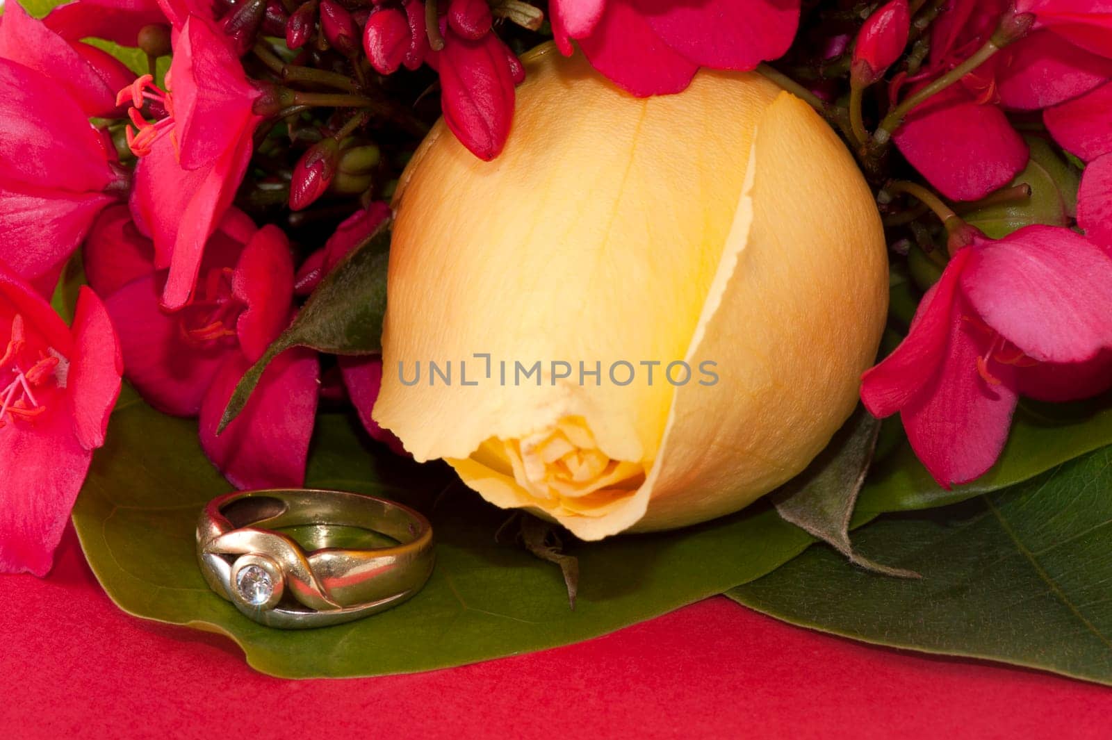 yellow rose, flowers, jewelry and envelope with ticket