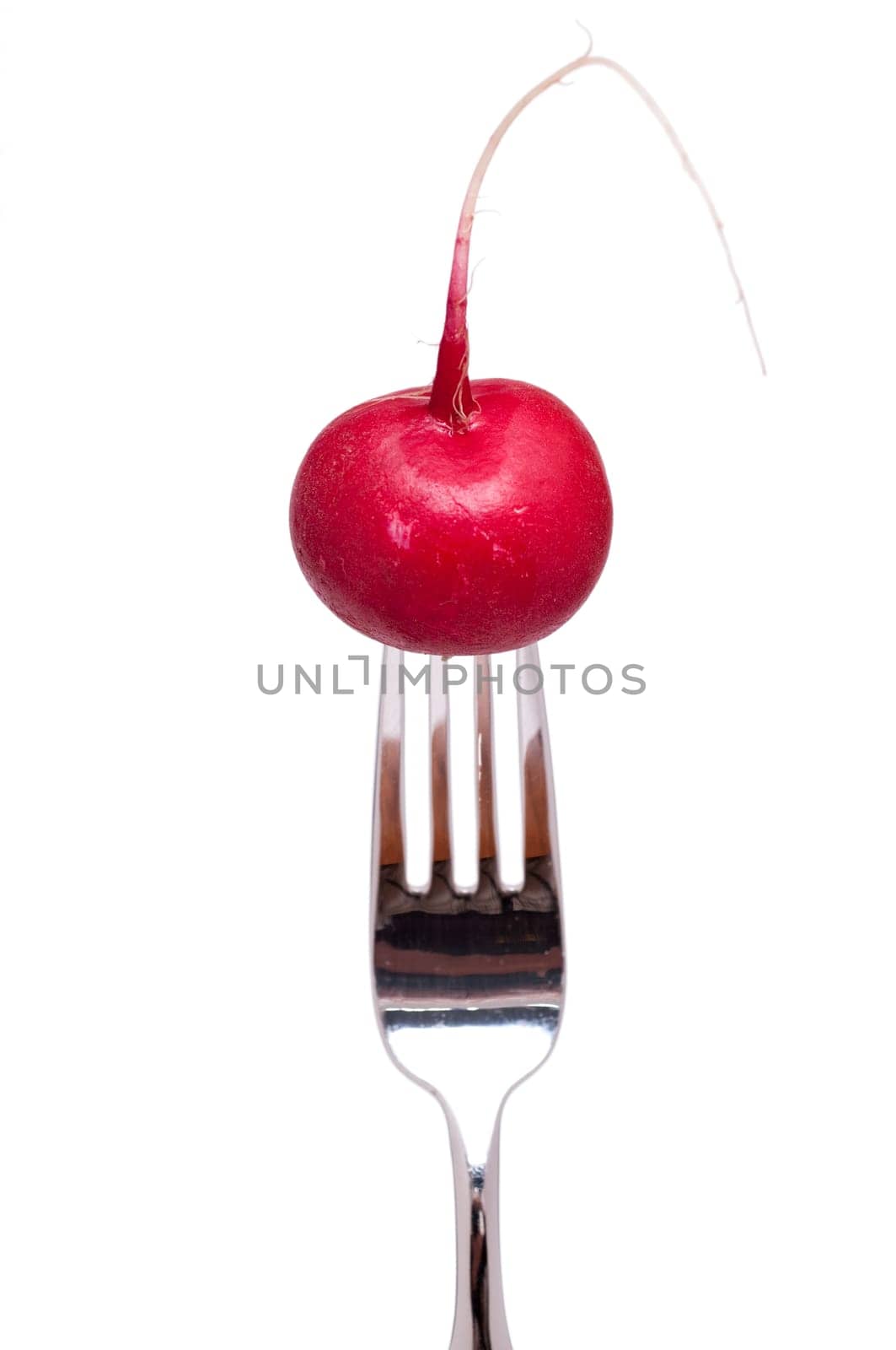 A white cut-out fork with a red radish
