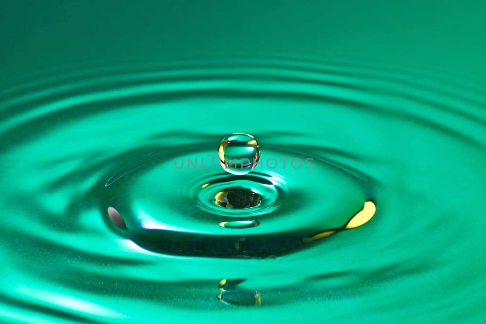 tranquility conceptual. calm droplet splash in a water