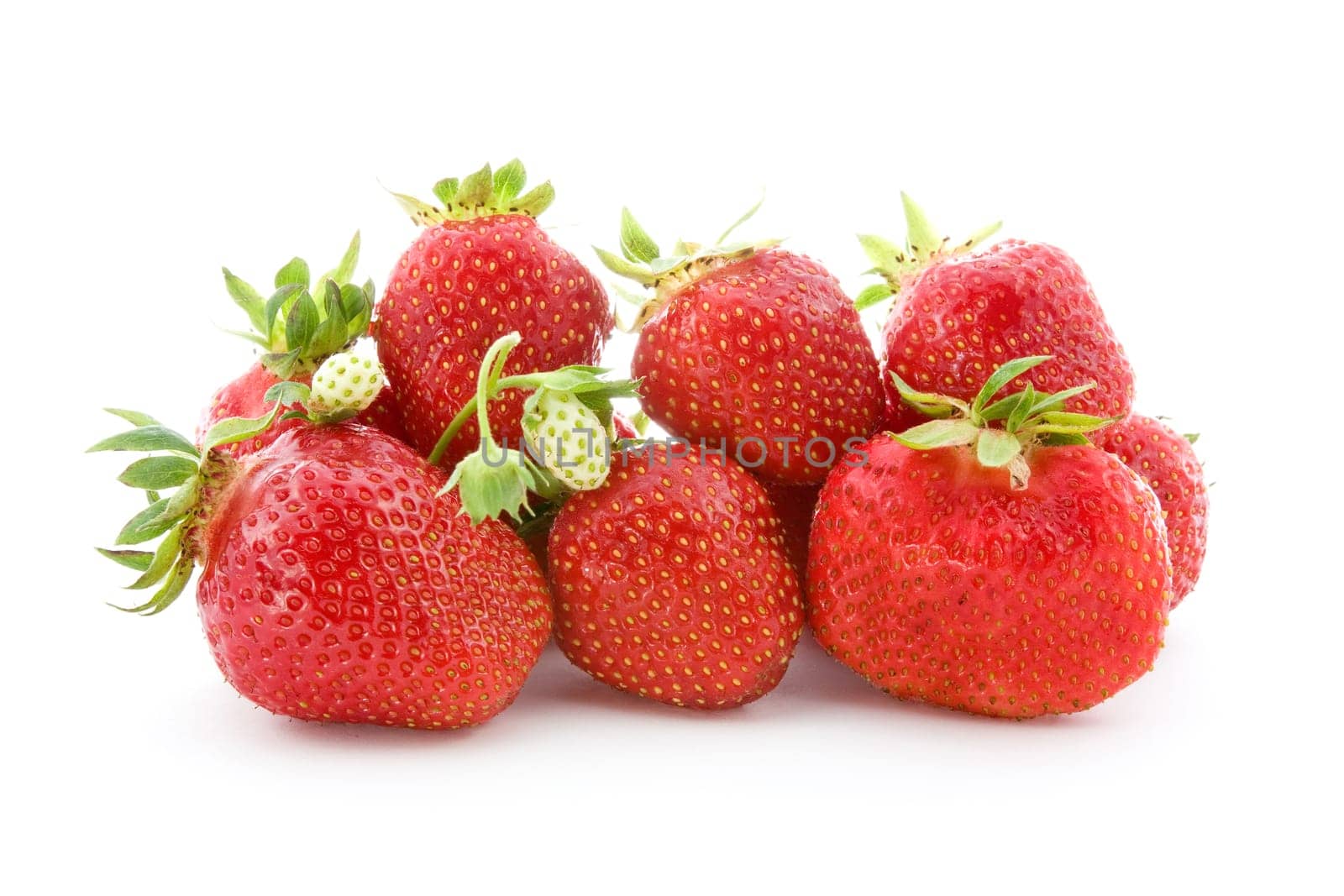 pile of fresh strawberries isolated on white