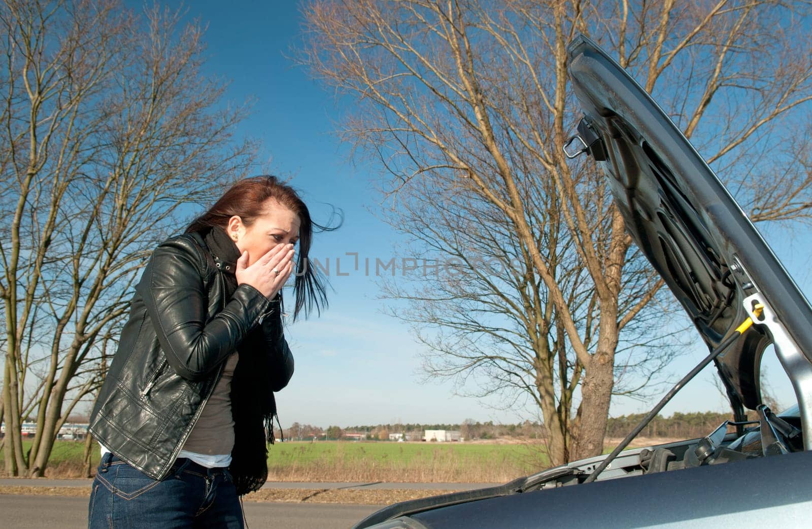Woman has a car breakdown