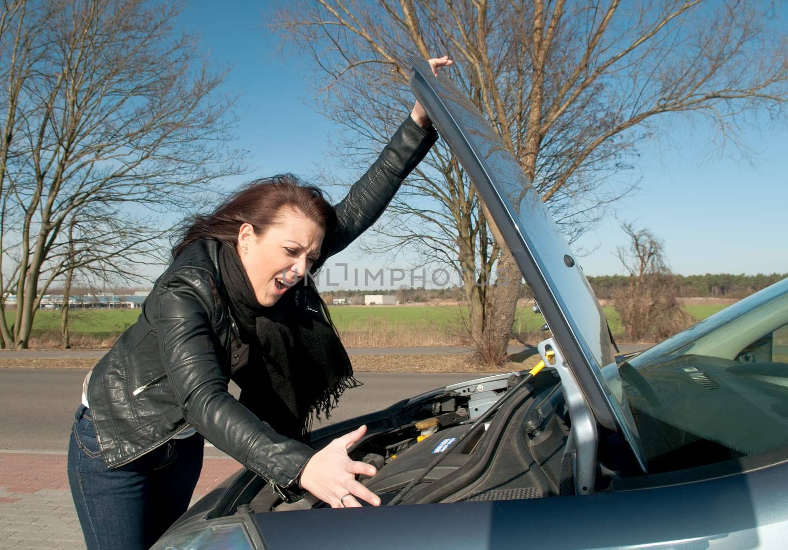 Woman has a car breakdown