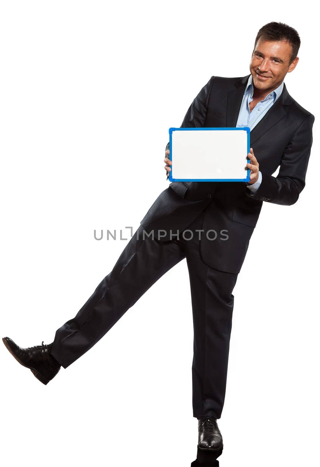 one caucasian business man holding showing whiteboard full length in studio isolated on white background