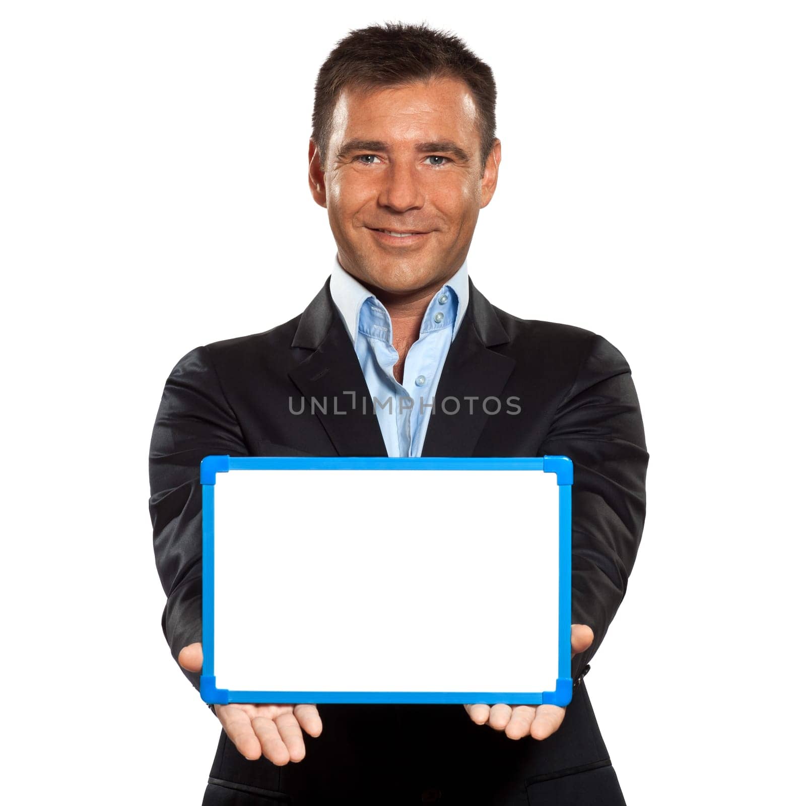 one caucasian business man holding showing whiteboard in studio isolated on white background