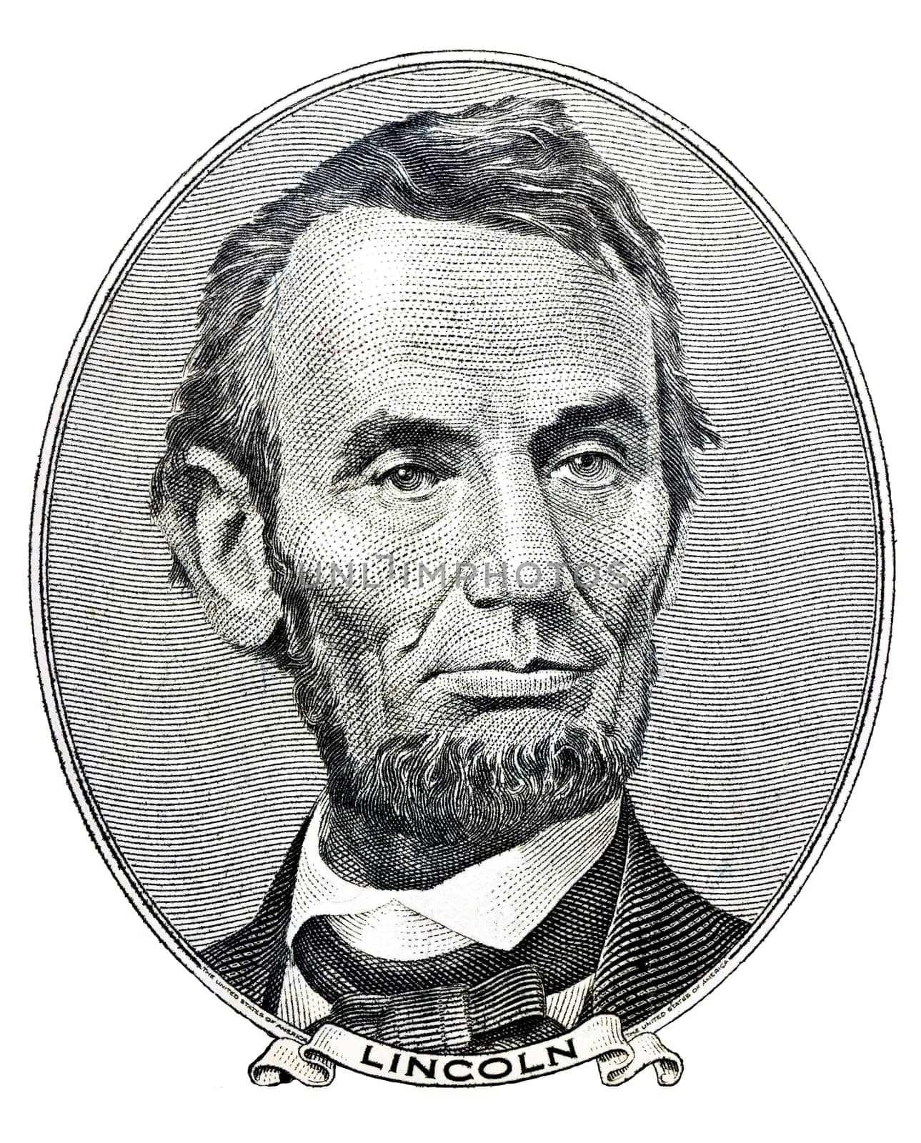 Portrait of former U.S. president Abraham Lincoln as he looks on five dollar bill obverse