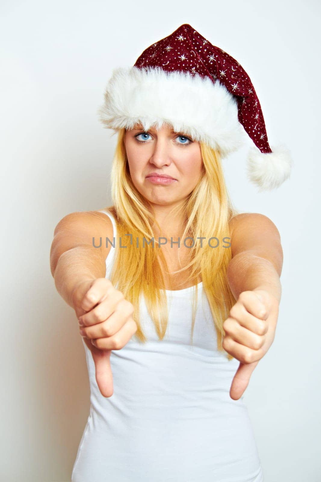 Frustrated Santa Claus with thumbs down