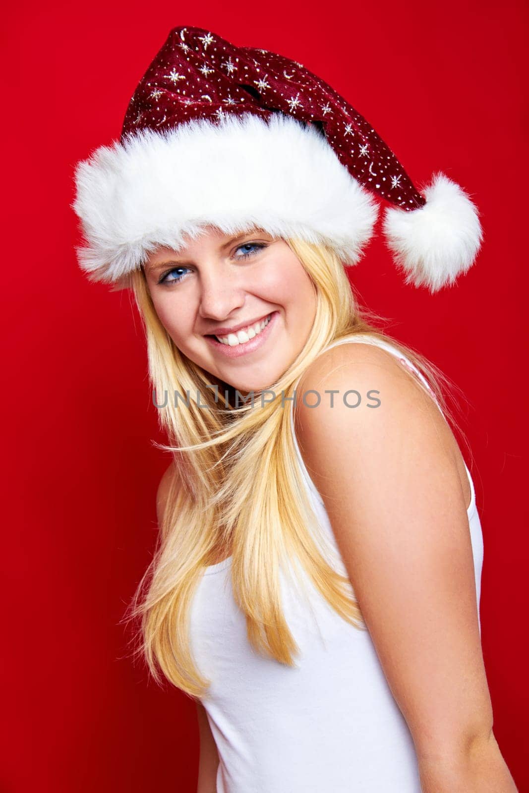 Laughing young beautiful woman at christmas