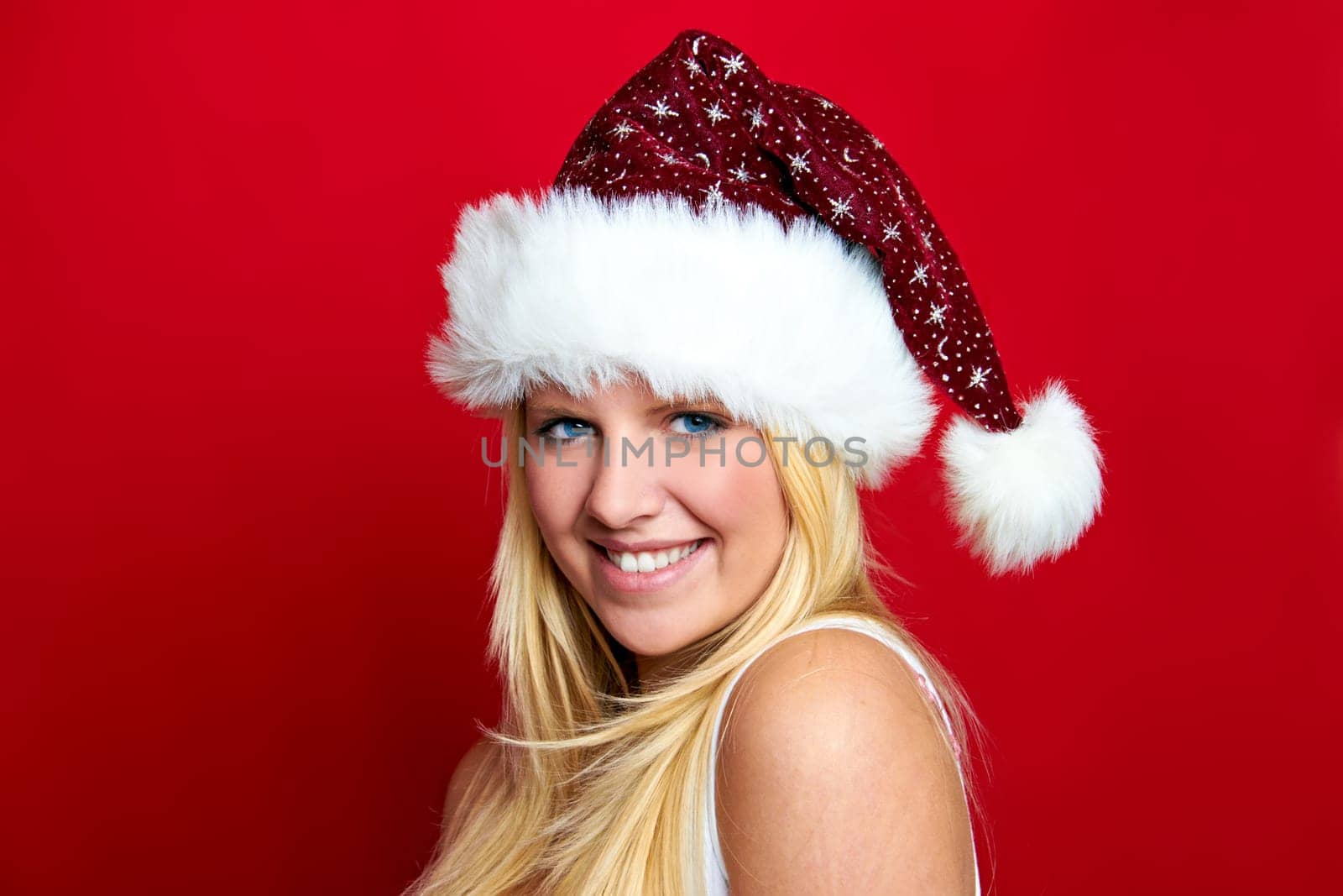 Laughing young beautiful woman at christmas