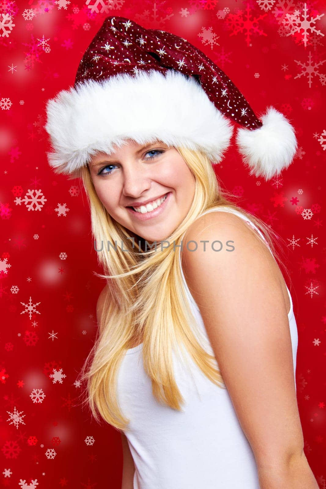 Laughing young beautiful woman at christmas