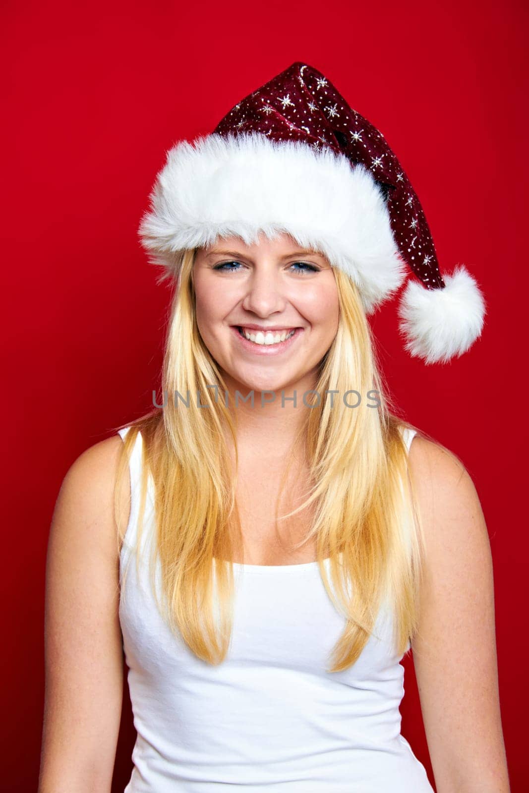 Laughing young beautiful woman at christmas