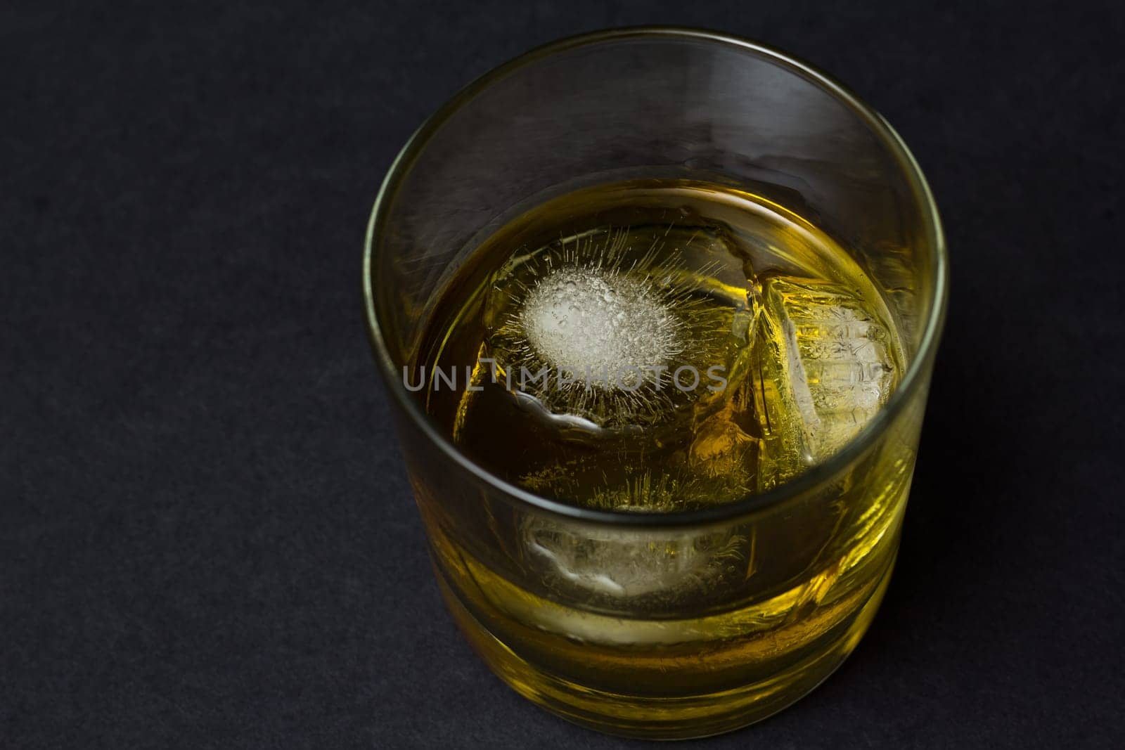 A glass of scotch whisky on the rocks