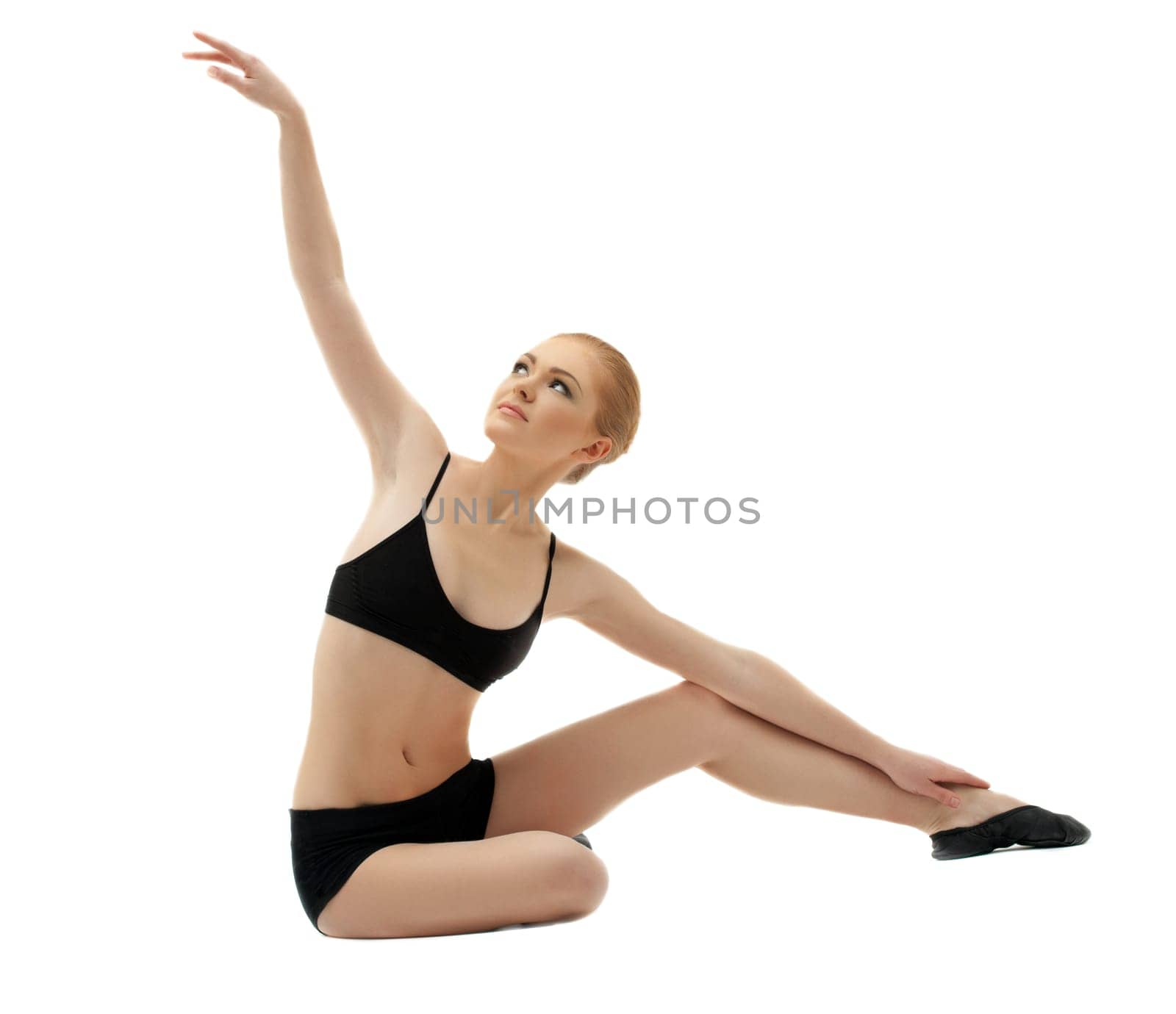 young woman relax in black training suit on white isolated