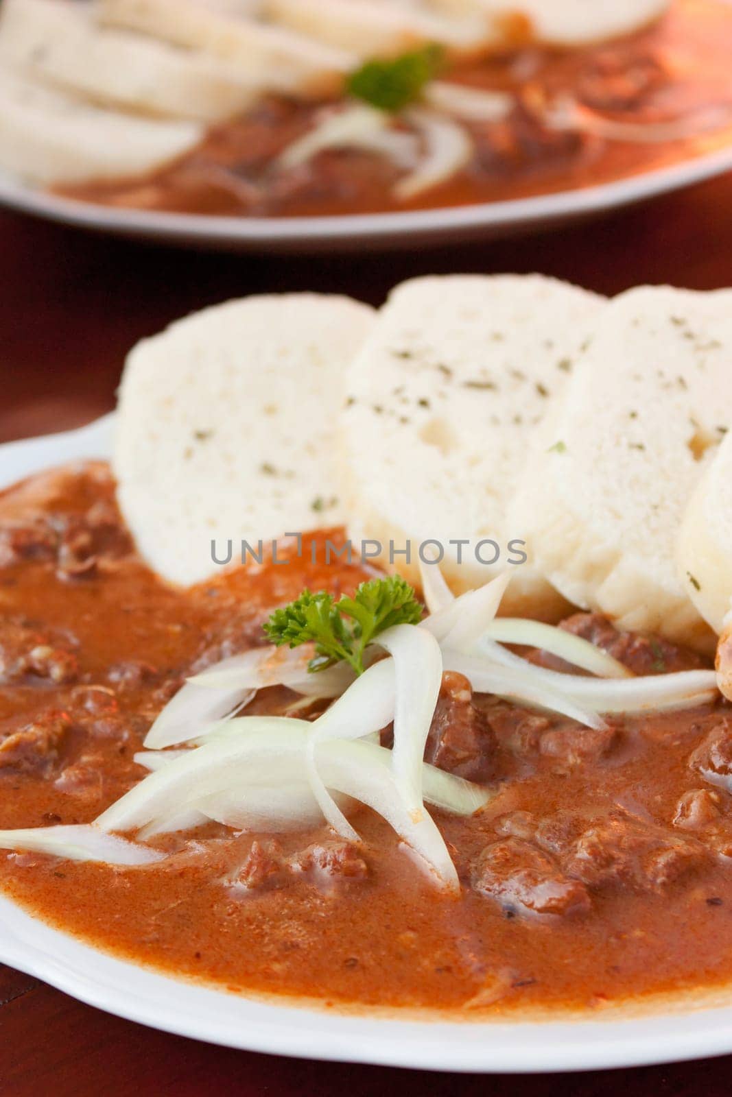 Beef goulash and dumplings (knedliky) from Czech Republic