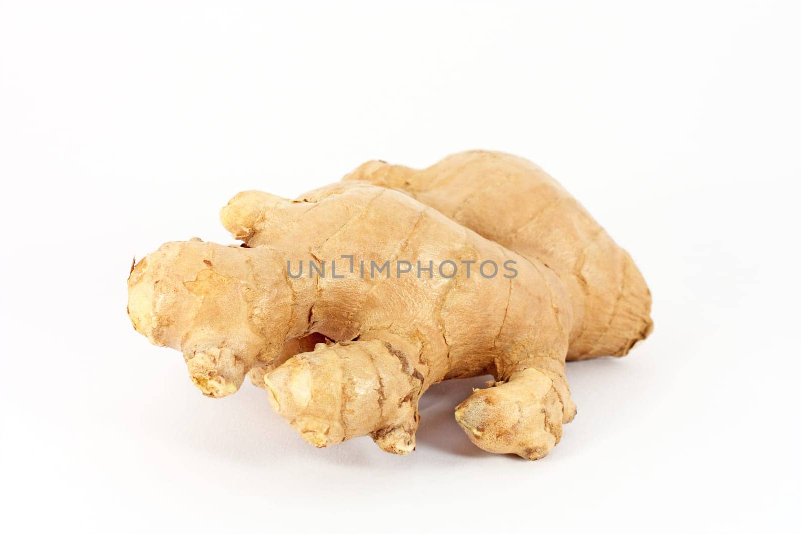 Ginger root closeup isolated on white background