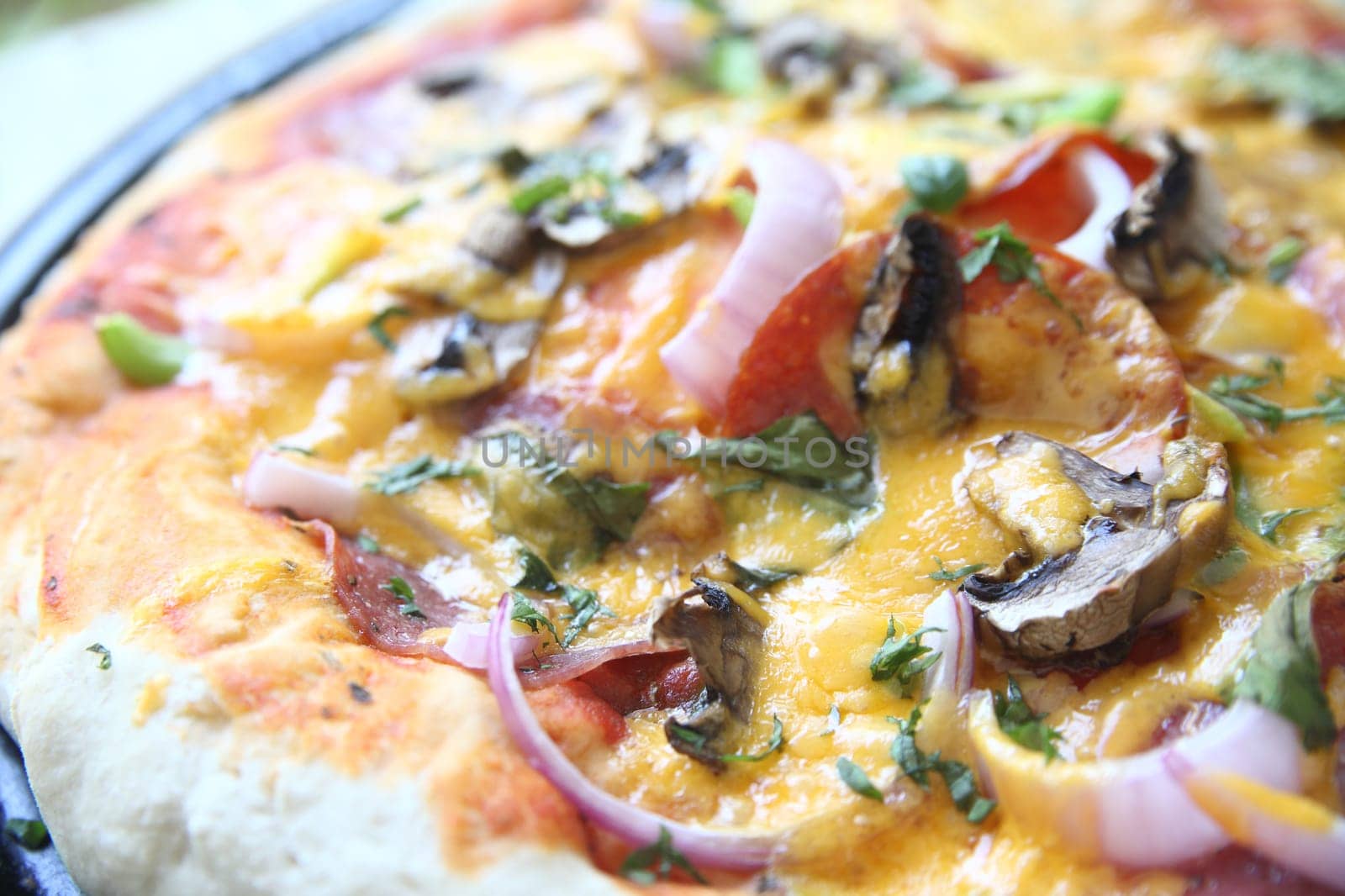 homemade pizza with various ingredients