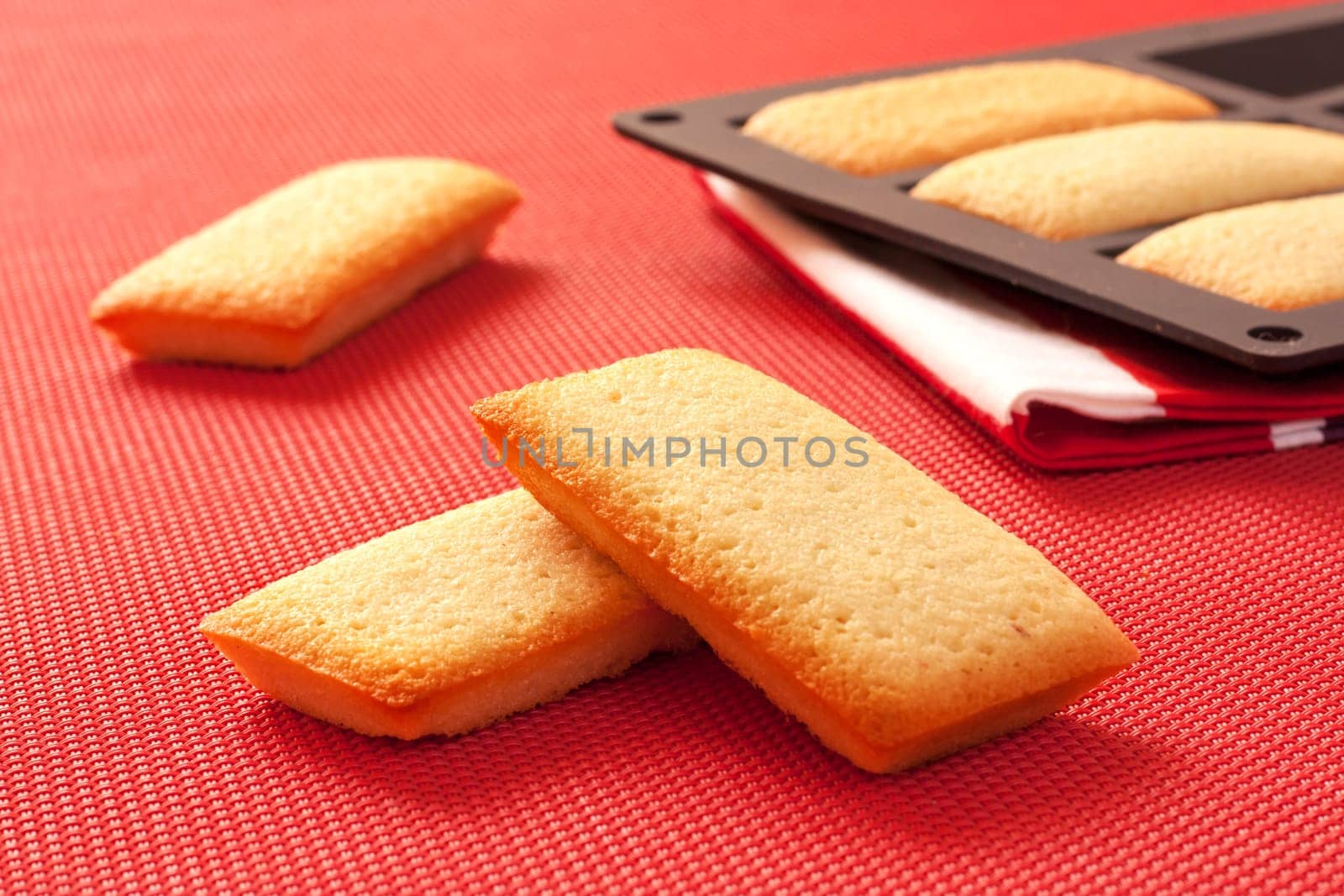 French biscuits called Financiers, with almond powder, smooth inside and crispy on the edges