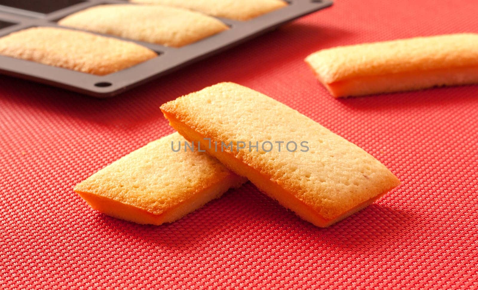 French biscuits called Financiers, with almond powder, smooth inside and crispy on the edges