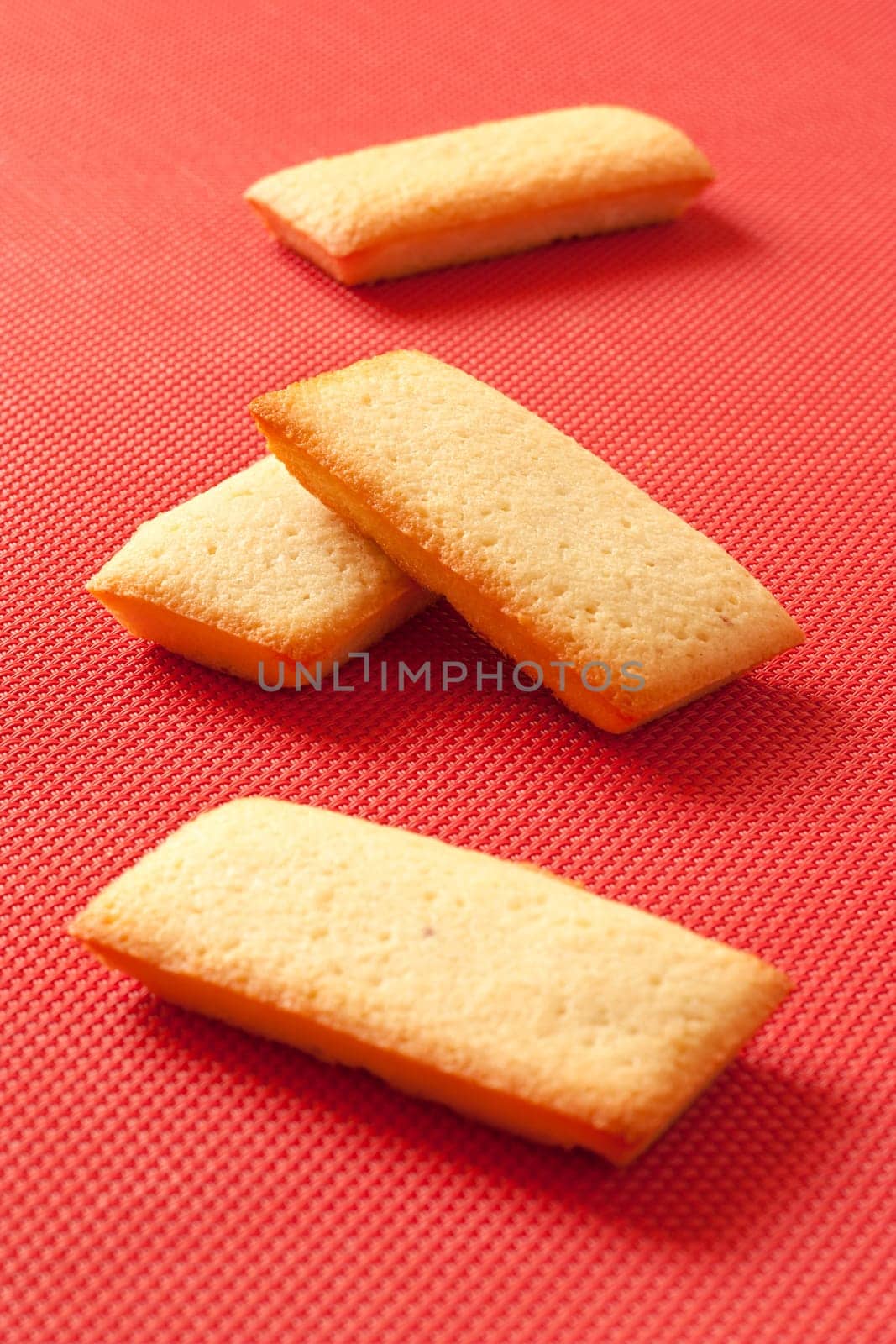 French biscuits called Financiers, with almond powder, smooth inside and crispy on the edges