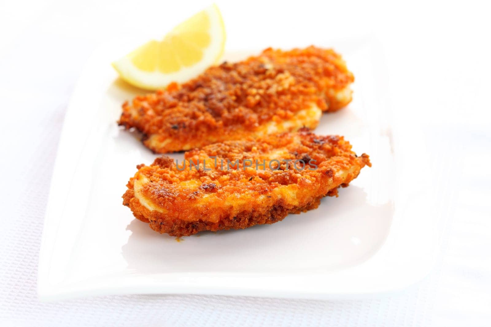 Fried chicken schnitzel with lemon
