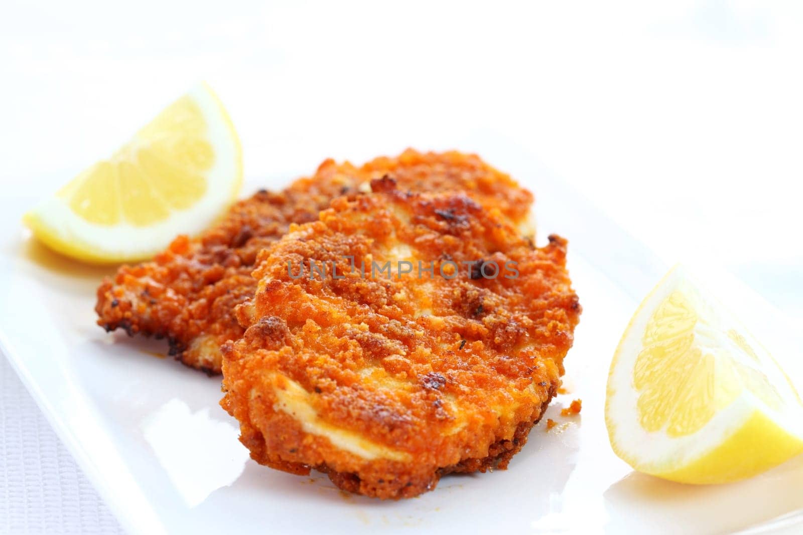 Fried chicken schnitzel with lemon