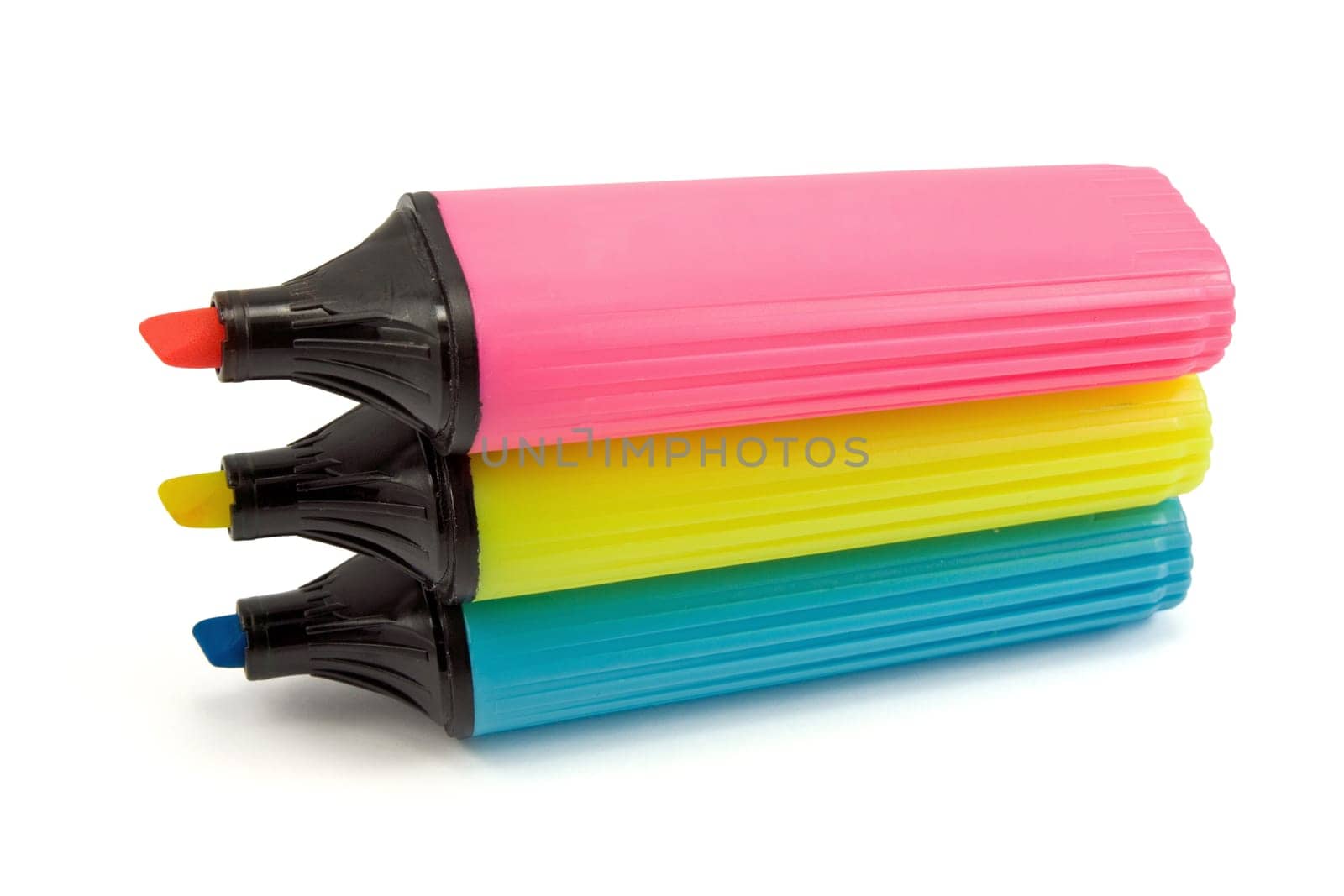 three colorful highlighter pens isolated on white background